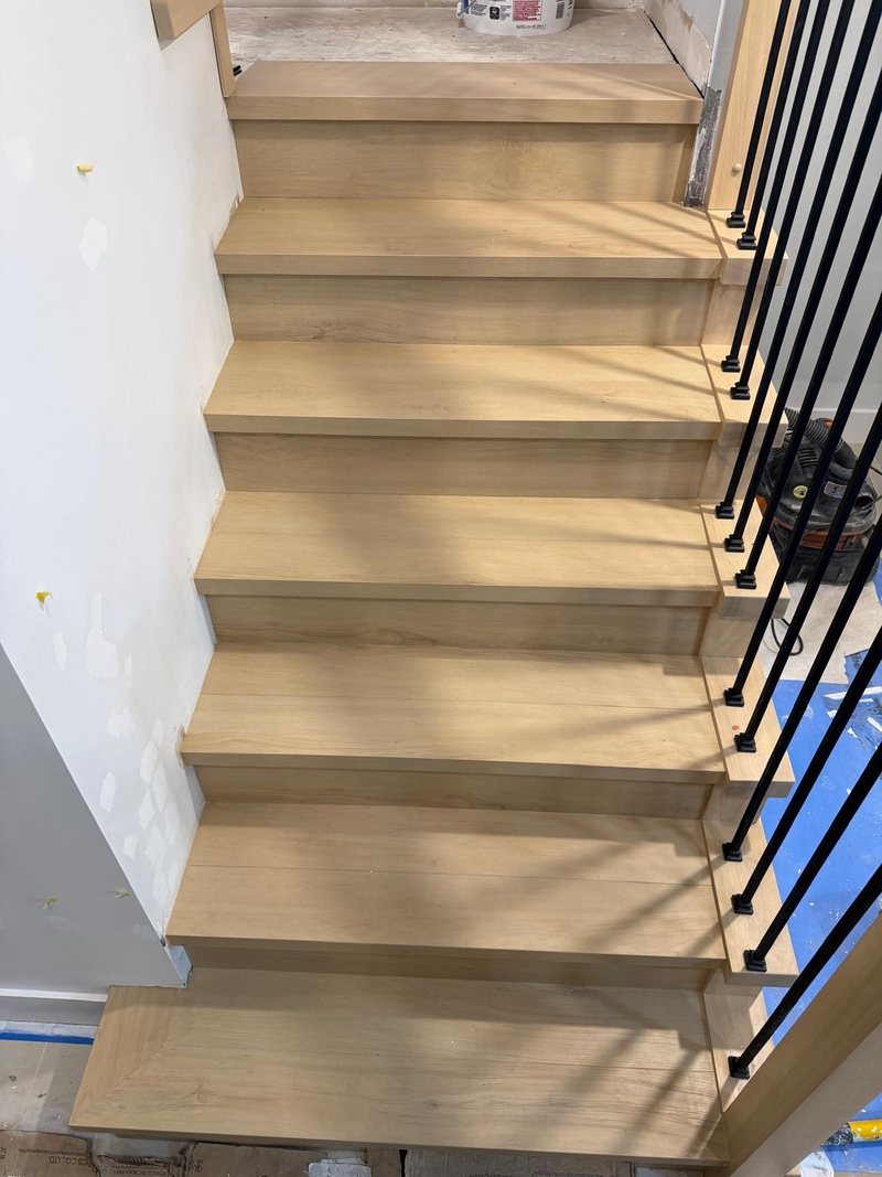 Looking down the finished stairs in a Surrey home