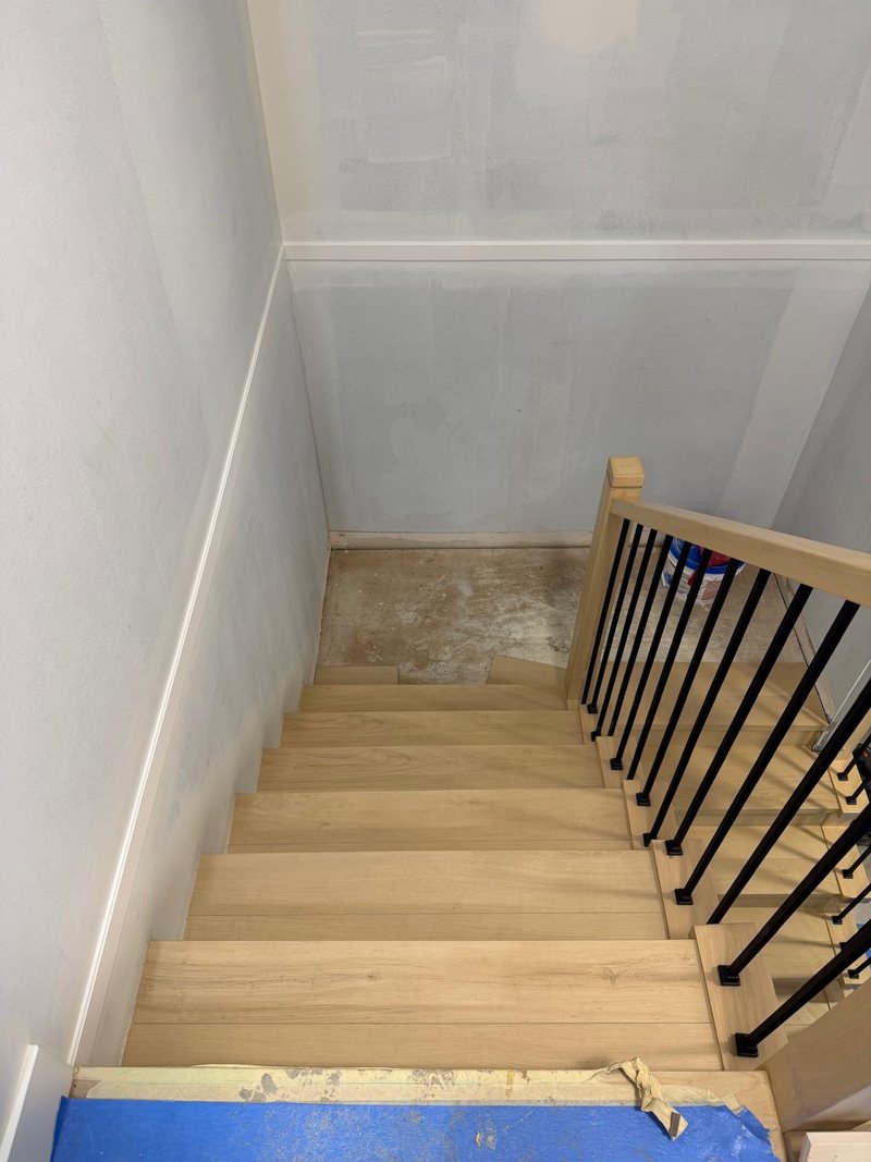 Lower flight of stairs finished in light oak, Surrey