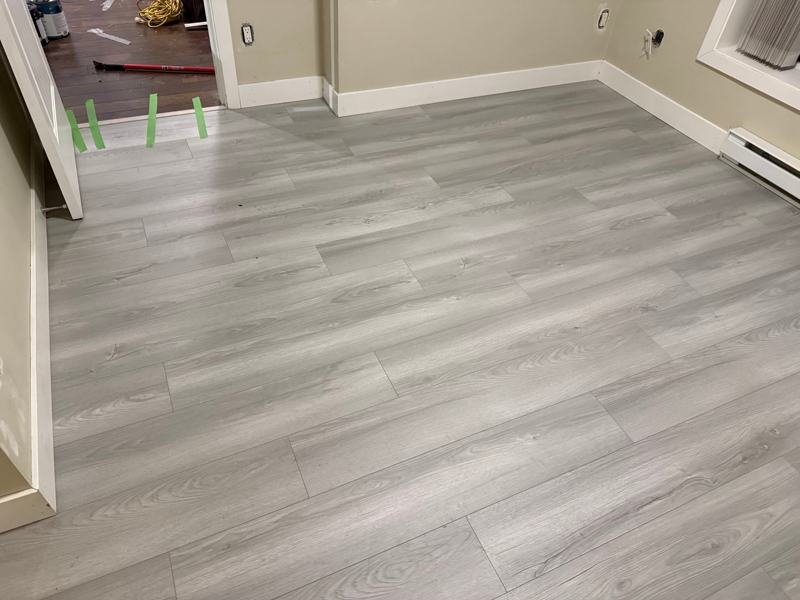 Laminate over levelled concrete in Burnaby by Craftbuild