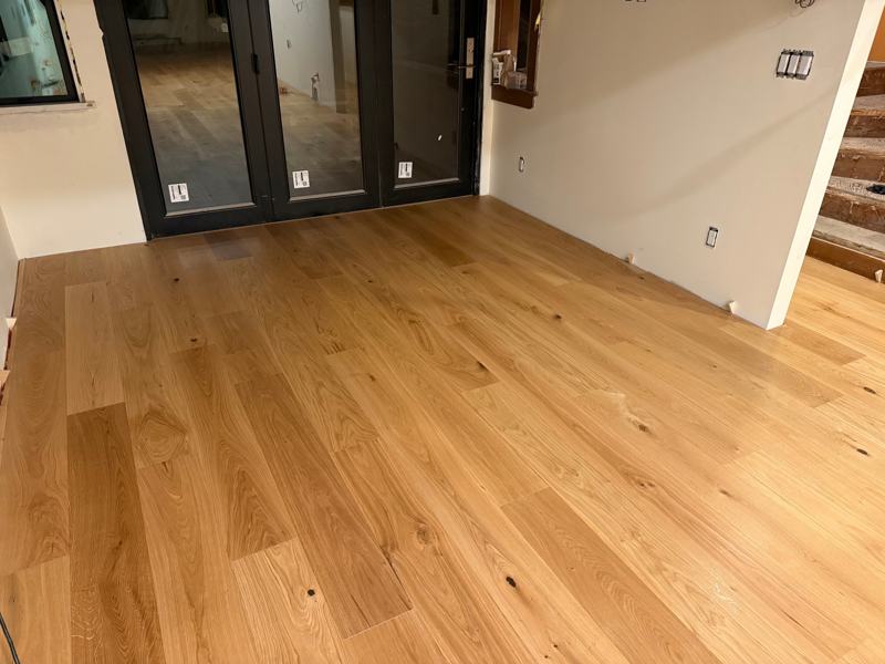 Glue-down hardwood floor installed by Craftbuild in Vancouver