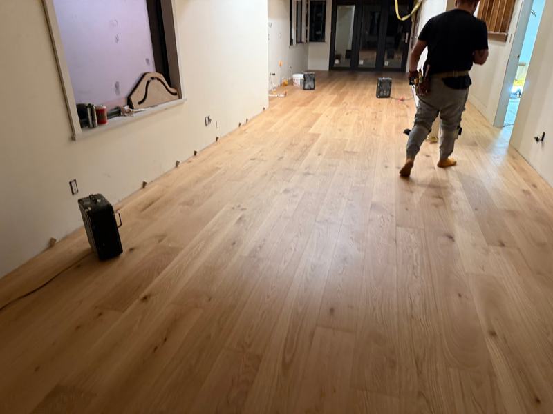 Glue-down hardwood floor installed by Craftbuild in Vancouver &mdash; photo 1