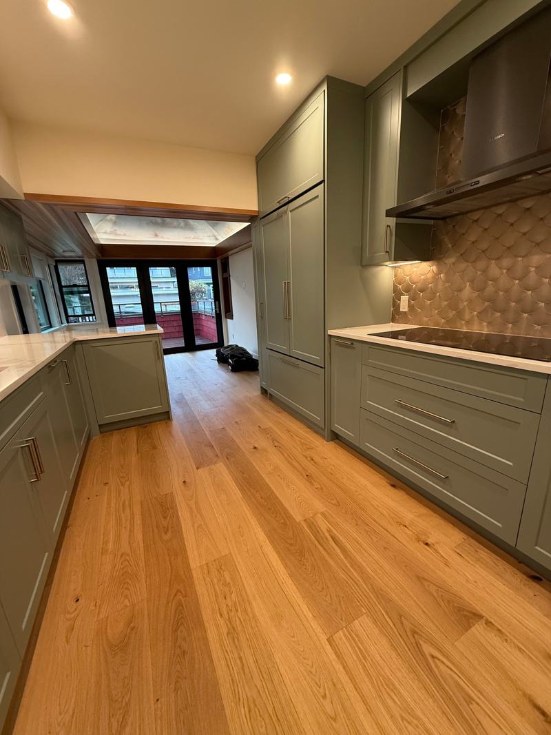 Glue-down hardwood floor installed by Craftbuild in Vancouver &mdash; photo 3