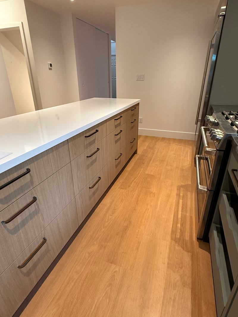Glue-down hardwood floor installed by Craftbuild in Vancouver &mdash; photo 8