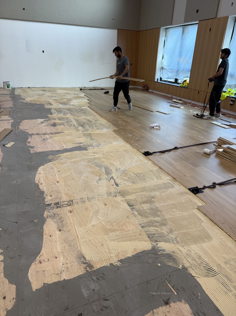 Engineered hardwood going down over the prepared subfloor, Pemberton