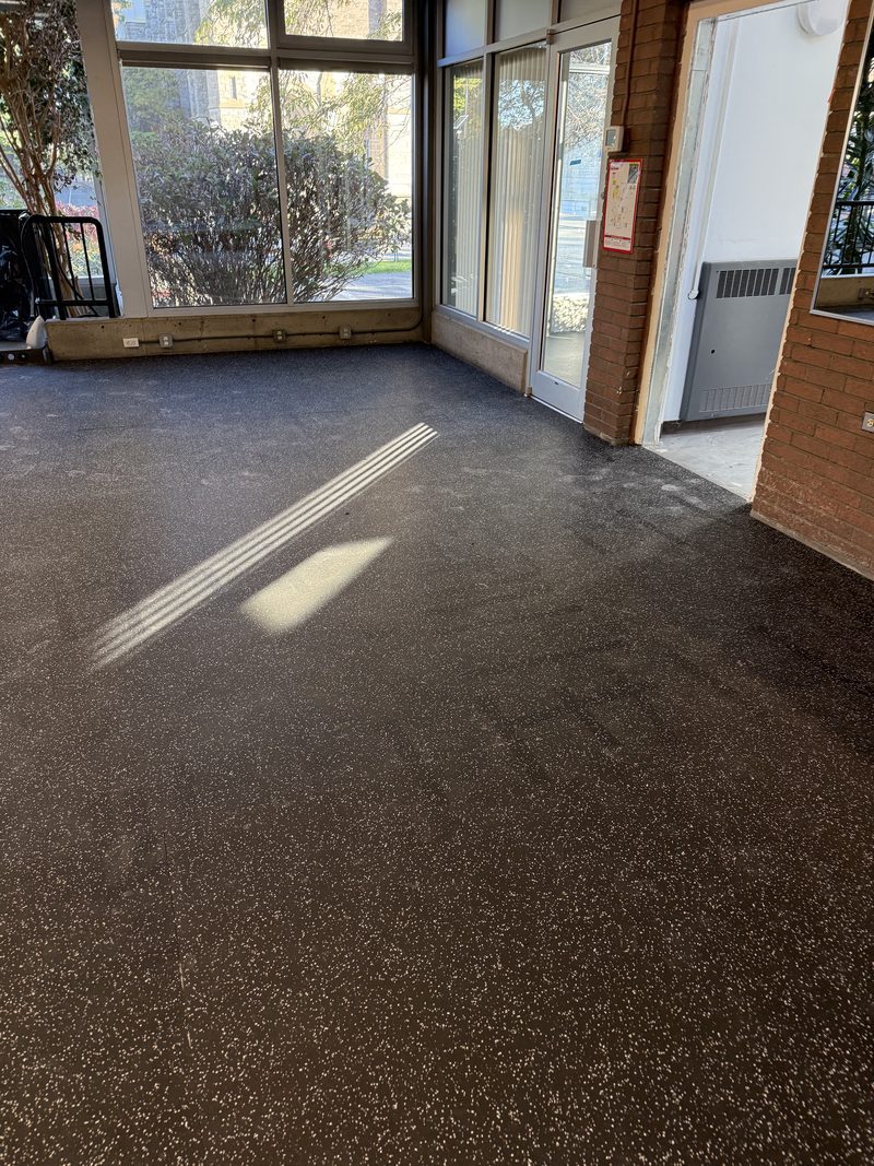 Rubber gym floor running to the entrance doors, Victoria